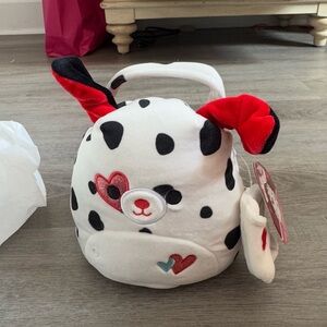 Squishmallow. 
Limited Edition Valentines Day
Pink 
Dustin.